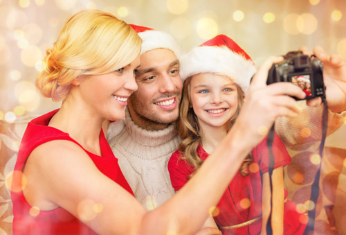 smiling-family-in-santa-helper